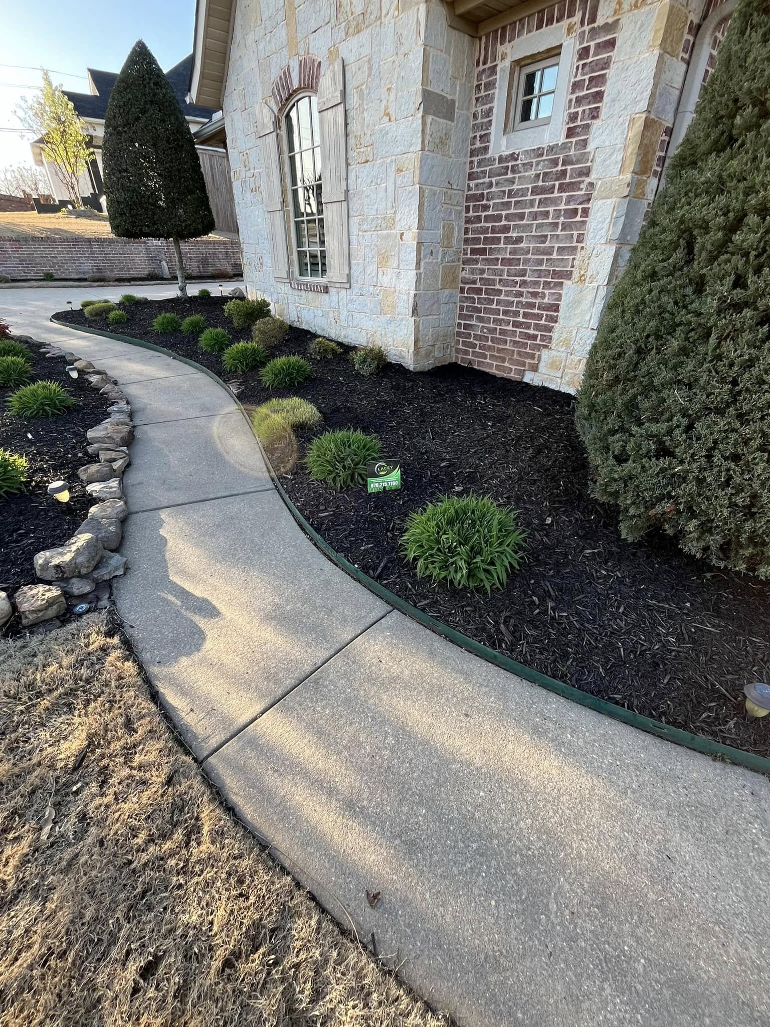 flowerbeds with brown mulch